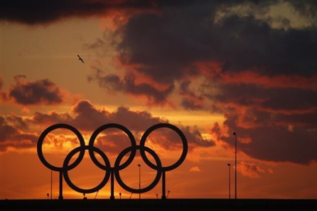 Olympic rings installed at a pier of the port of the Black Sea resort of Sochi at sunset, Russia, Thursday, Nov. 12, 2015. (AP Photo/Dmitry Lovetsky)