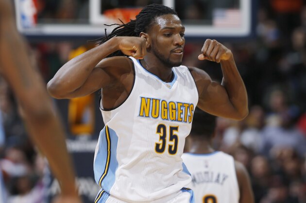 Denver Nuggets forward Kenneth Faried celebrates after scoring following an offensive rebound against the Chicago Bulls late in the second half of an NBA basketball game Friday, Feb. 5, 2016, in Denver. The Nuggets won 115-110. (AP Photo/David Zalubowski)