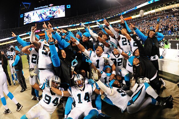 CHARLOTTE, NC - JANUARY 24: Cam Newton #1 of the Carolina Panthers celebrates with teammates late in the NFC Championship Game against the Arizona Cardinals at Bank Of America Stadium on January 24, 2016 in Charlotte, North Carolina. (Photo by Scott Cunningham/Getty Images)