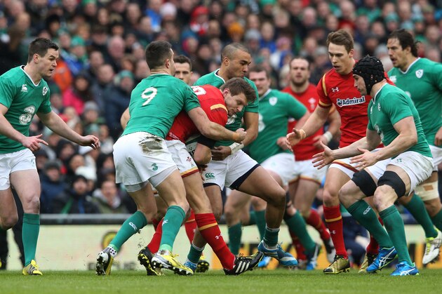 DUBLIN, IRELAND - FEBRUARY 07:  Dan Biggar of Wales is wrapped up by Conor Murray and Simon Zebo of Ireland during the RBS Six Nations match between Ireland and Wales at the Aviva Stadium on February 7, 2016 in Dublin, Ireland.  (Photo by David Rogers/Getty Images)