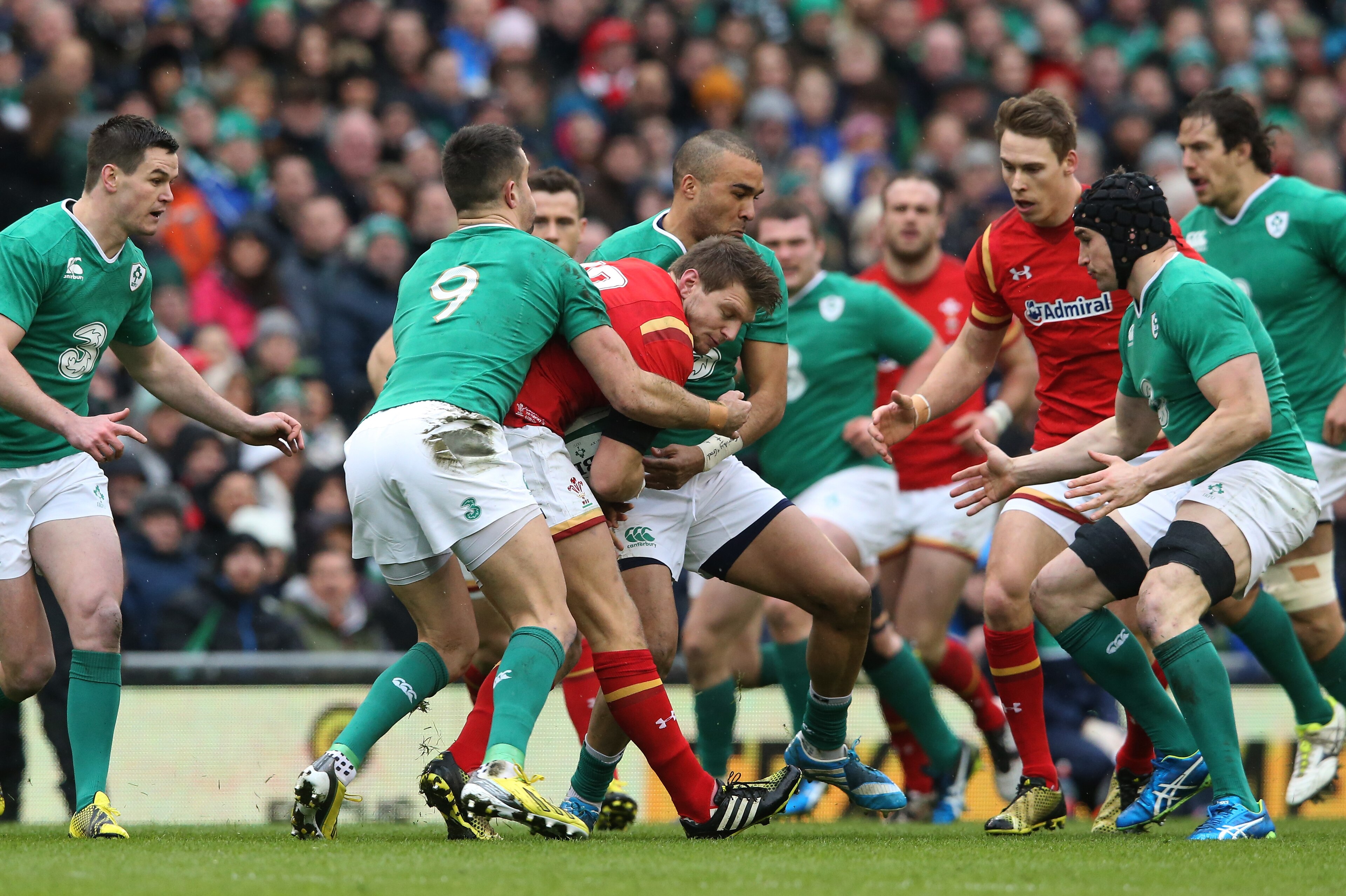 DUBLIN, IRELAND - FEBRUARY 07:  Dan Biggar of Wales is wrapped up by Conor Murray and Simon Zebo of Ireland during the RBS Six Nations match between Ireland and Wales at the Aviva Stadium on February 7, 2016 in Dublin, Ireland.  (Photo by David Rogers/Getty Images)