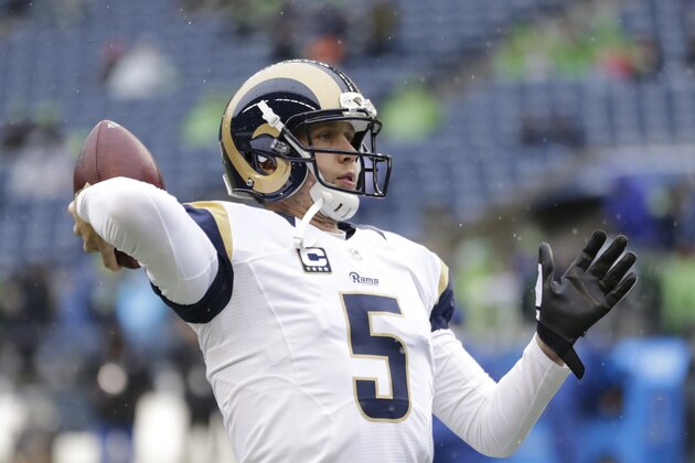 St. Louis Rams quarterback Nick Foles throws during warmups before an NFL football game against the Seattle Seahawks, Sunday, Dec. 27, 2015, in Seattle. (AP Photo/Stephen Brashear)