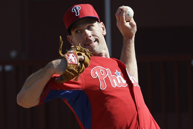Philadelphia Phillies starting pitcher Cliff Lee throws during a spring training baseball workout, Thursday, Feb. 19, 2015, in Clearwater, Fla. (AP Photo/Lynne Sladky)