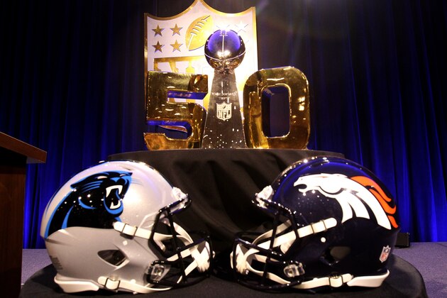 SAN FRANCISCO, CA - FEBRUARY 05:  The Vince Lombardi Trophy sits in front of a gold '50' with the helmets of the Carolina Panthers and Denver Broncos before the 2015 Walter Payton Man of the Year Finalist press conference prior to Super Bowl 50 at the Moscone Center West on February 5, 2016 in San Francisco, California.  (Photo by Mike Lawrie/Getty Images)