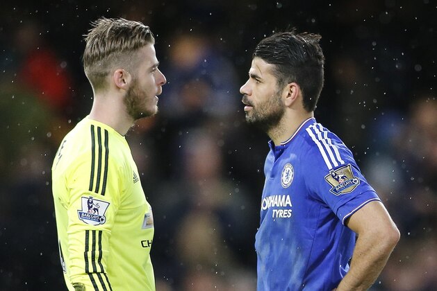 Chelsea's Diego Costa, right, speaks to Manchester United's goalkeeper David de Gea after  the English Premier League soccer match between Chelsea and Manchester United at Stamford Bridge stadium in London, Sunday, Feb. 7, 2016.  (AP Photo/Frank Augstein)