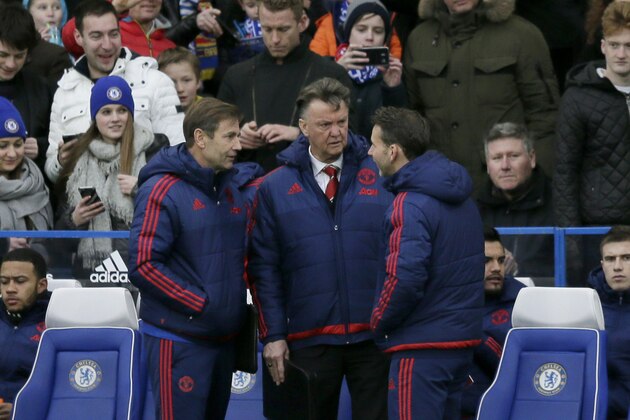 Manchester United's manager Louis van Gaal, center, is seen before the English Premier League soccer match between Chelsea and Manchester United at Stamford Bridge stadium in London, Sunday, Feb. 7, 2016.  (AP Photo/Tim Ireland)