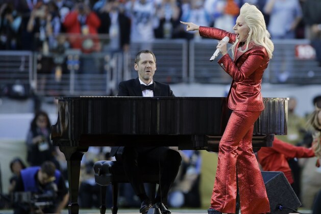 Lady Gaga sings the national anthem before the NFL Super Bowl 50 football game between the Denver Broncos and the Carolina Panthers, Sunday, Feb. 7, 2016, in Santa Clara, Calif. (AP Photo/Julie Jacobson)