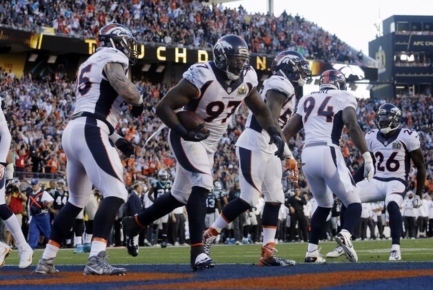 Denver Broncos’ Malik Jackson (97) celebrates after scoring a touchdown during the first half of the NFL Super Bowl 50 football game Sunday, Feb. 7, 2016, in Santa Clara, Calif. (AP Photo/Julie Jacobson)