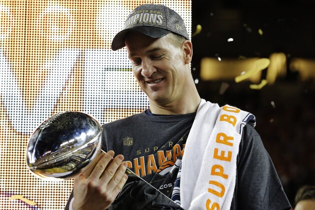 Denver Broncos’ Peyton Manning holds up the trophy after the NFL Super Bowl 50 football game Sunday, Feb. 7, 2016, in Santa Clara, Calif. The Broncos beat the Panthers 24-10.  (AP Photo/David J. Phillip)