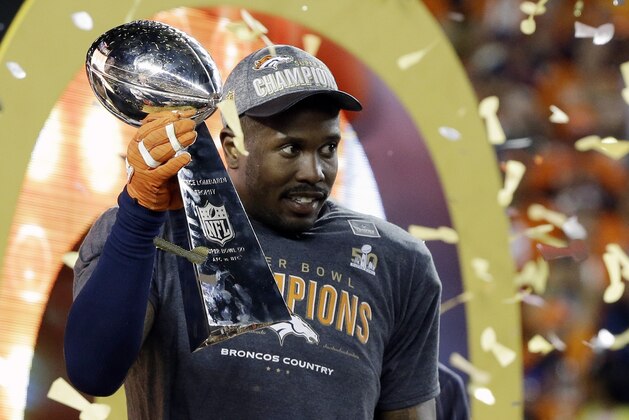 Denver Broncos’ Von Miller (58) holds the trophy after the NFL Super Bowl 50 football game Sunday, Feb. 7, 2016, in Santa Clara, Calif. The Broncos won 24-10.(AP Photo/Julie Jacobson)
