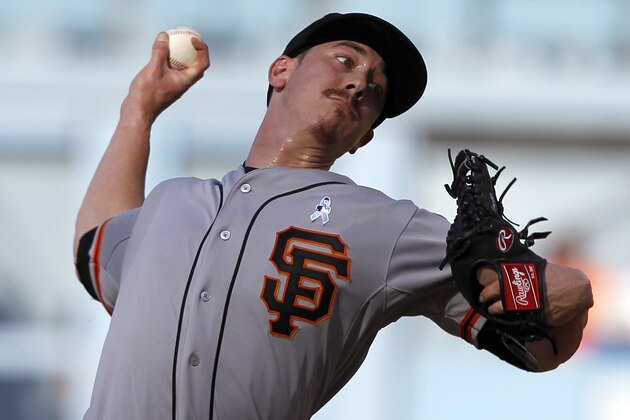 San Francisco Giants starting pitcher Tim Lincecum throws against the Los Angeles Dodgers during the first inning of a baseball game in Los Angeles, Sunday, June 21, 2015. (AP Photo/Alex Gallardo)