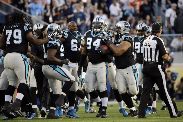Carolina Panthers’ Kony Ealy (94) celebrates after intercepting a pass during the first half of the NFL Super Bowl 50 football game Sunday, Feb. 7, 2016, in Santa Clara, Calif.  (AP Photo/Julie Jacobson)