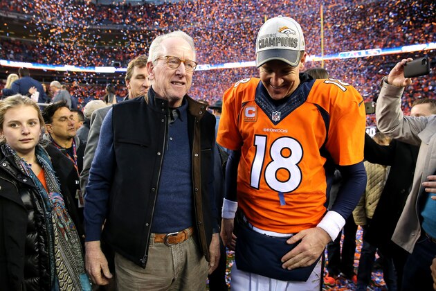 DENVER, CO - JANUARY 24:  Peyton Manning #18 of the Denver Broncos and father Archie Manning walk off the field after defeating the New England Patriots in the AFC Championship game at Sports Authority Field at Mile High on January 24, 2016 in Denver, Colorado. The Broncos defeated the Patriots 20-18. (Photo by Doug Pensinger/Getty Images)