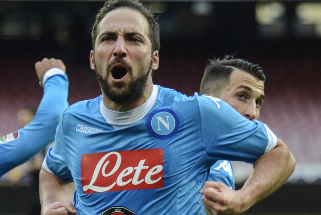 Napoli's Gonzalo Higuain celebrates after scoring during a Serie A soccer match between Napoli and Carpi, at the San Paolo stadium in Naples, Italy, Sunday, Feb. 7, 2016. (AP Photo/Salvatore Laporta)