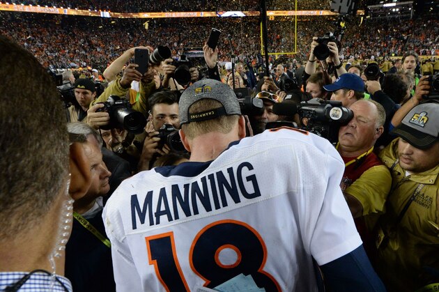 Quarterback Petyton Manning of the Denver Broncos is surrounded by the media following victory over the Carolina Panthers in Super Bowl 50 at Levi's Stadium in Santa Clara, California February 7, 2016.
Peyton Manning clinched a fairytale second Super Bowl victory as the Denver Broncos produced an astonishing defensive display to defeat the Carolina Panthers 24-10. / AFP / TIMOTHY A. CLARY        (Photo credit should read TIMOTHY A. CLARY/AFP/Getty Images)