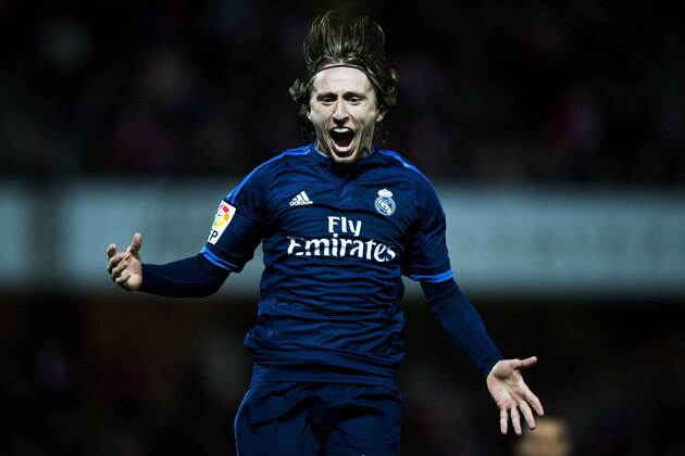 GRANADA, SPAIN - FEBRUARY 07: Luka Modric of Real Madrid CF celebrates scoring their second goal during the La Liga match between Granada CF and Real Madrid CF at Estadio Nuevo Los Carmenes on February 7, 2016 in Granada, Spain.  (Photo by Gonzalo Arroyo Moreno/Getty Images)