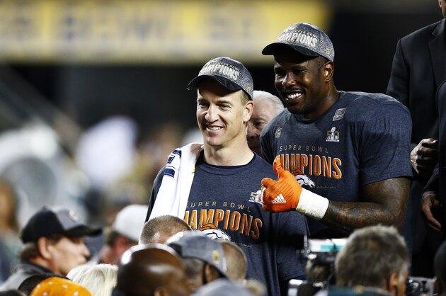 SANTA CLARA, CA - FEBRUARY 07:  Peyton Manning #18 and  Von Miller #58 of the Denver Broncos celebrate after defeating the Carolina Panthers during Super Bowl 50 at Levi's Stadium on February 7, 2016 in Santa Clara, California. The Broncos defeated the Panthers 24-10. (Photo by Al Bello/Getty Images)