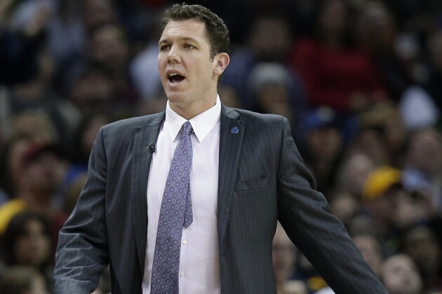 Golden State Warriors assistant coach Luke Waton yells to players in the first half of an NBA basketball game against the Cleveland Cavaliers, Monday, Jan. 18, 2016, in Cleveland. The Warriors won 132-98. (AP Photo/Tony Dejak)