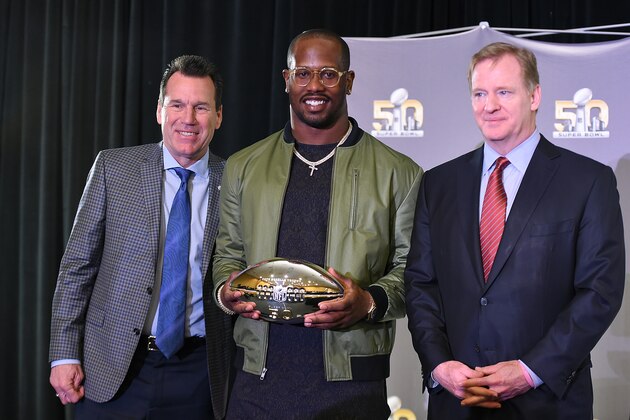 SAN FRANCISCO, CA - FEBRUARY 08:  Head coach Gary Kubiak of the Denver Broncos (L) and NFL commissioner Roger Goodell (R) poses with the Super Bowl 50 MVP Von Miller holding the trophy at the Moscone Center West on February 8, 2016 in San Francisco, California.  (Photo by Thearon W. Henderson/Getty Images)