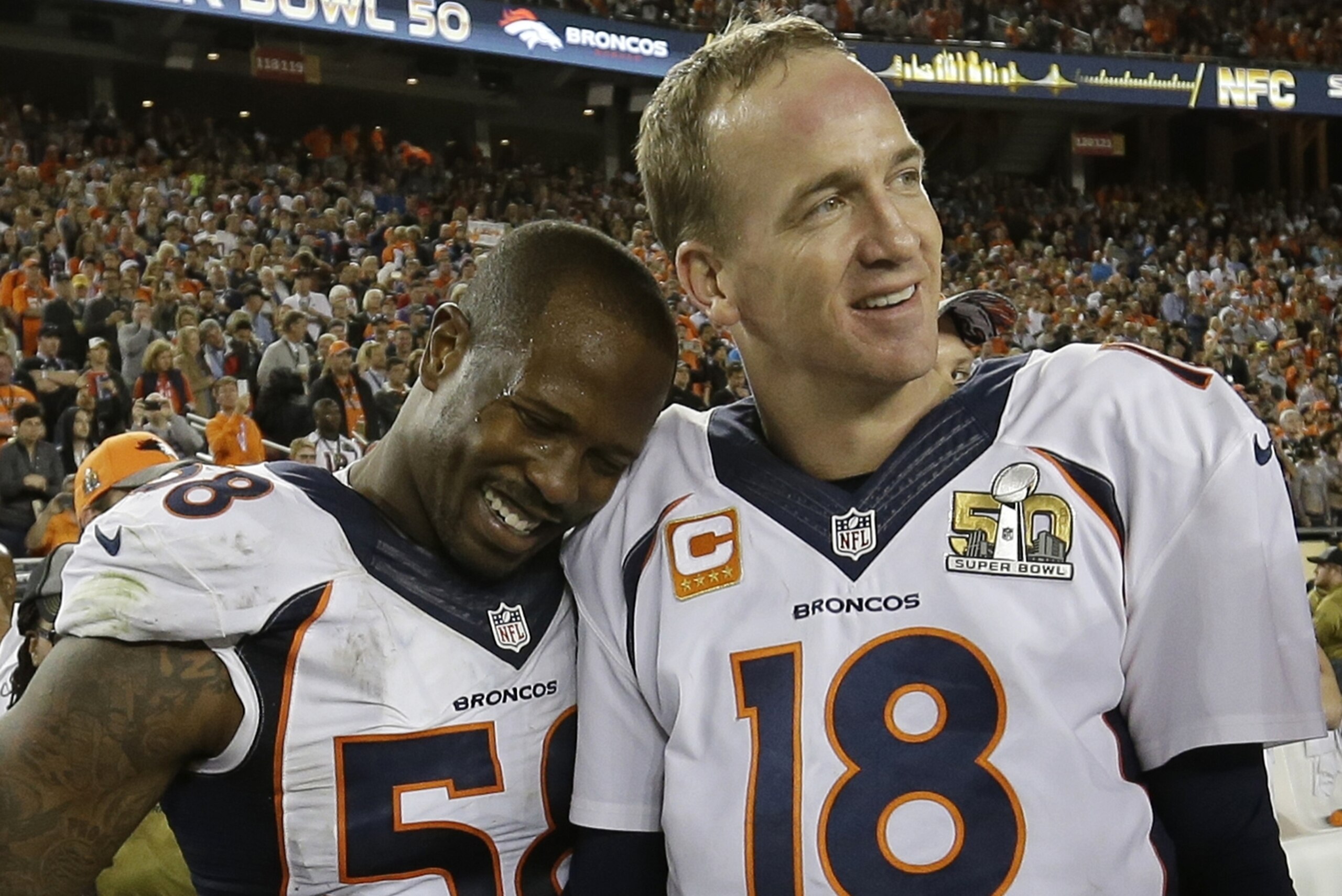 Denver Broncos’ Von Miller (58) and Peyton Manning (18) celebrate after the NFL Super Bowl 50 football game Sunday, Feb. 7, 2016, in Santa Clara, Calif. The Broncos beat the Panthers 24-10. (AP Photo/David J. Phillip) Denver Broncos’ Von Miller (58) and Peyton Manning (18) celebrate after the NFL Super Bowl 50 football game Sunday, Feb. 7, 2016, in Santa Clara, Calif. The Broncos beat the Panthers 24-10. (AP Photo/David J. Phillip)