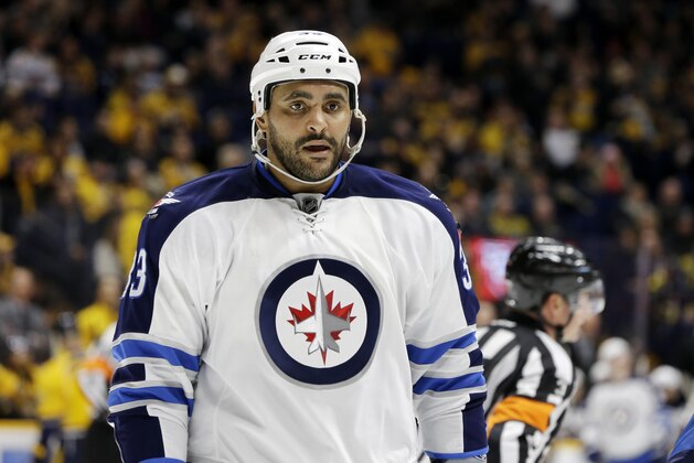 Winnipeg Jets defenseman Dustin Byfuglien plays against the Nashville Predators in the second period of an NHL hockey game Tuesday, Jan. 5, 2016, in Nashville, Tenn. (AP Photo/Mark Humphrey)