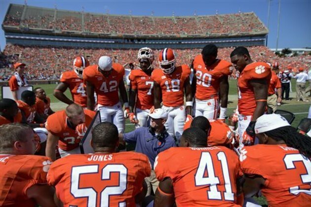 THIS CORRECTS THE DATE TO SEPT. 7, 2013, AND NOT AUG. 31, 2013 AS ORIGINALLY SENT -  Defensive coach Brent Venables gives instructions to his players during the second half  of an NCAA college football game Saturday against South Carolina State, Sept. 7, 2013 at Memorial Stadium in Clemson, S.C.(AP Photo/ Richard Shiro)