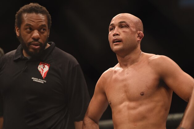 LAS VEGAS, NV - JULY 06:  BJ Penn (R) looks on after being defeated by Frankie Edgar in their featherweight fight during the Ultimate Fighter Finale inside the Mandalay Bay Events Center on July 6, 2014 in Las Vegas, Nevada.  (Photo by Jeff Bottari/Zuffa LLC/Zuffa LLC via Getty Images)
