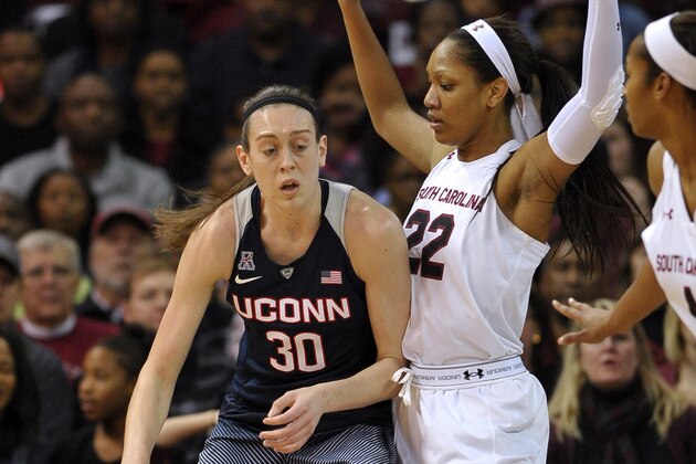 COLUMBIA, SC - FEBRUARY 08:  Breanna Stewart #30 of the Connecticut Huskies moves the ball against A'ja Wilson #22 of the South Carolina Gamecocks at Colonial Life Arena on February 8, 2016 in Columbia, South Carolina. (Photo by Lance King/Getty Images)