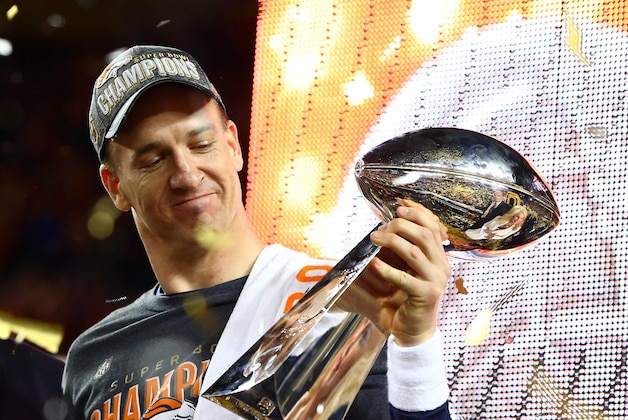 Feb 7, 2016; Santa Clara, CA, USA; Denver Broncos quarterback Peyton Manning (18) hoists the Vince Lombardi Trophy after defeating the Carolina Panthers in Super Bowl 50 at Levi's Stadium. Mandatory Credit: Mark J. Rebilas-USA TODAY Sports