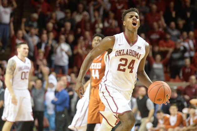 Feb 8, 2016; Norman, OK, USA; Oklahoma Sooners guard Buddy Hield (24) reacts after intercepting an inbounds pass to seal the victory against the Texas Longhorns. The Sooners defeated the Longhorns 63-60 at Lloyd Noble Center. Mandatory Credit: Mark D. Smith-USA TODAY Sports