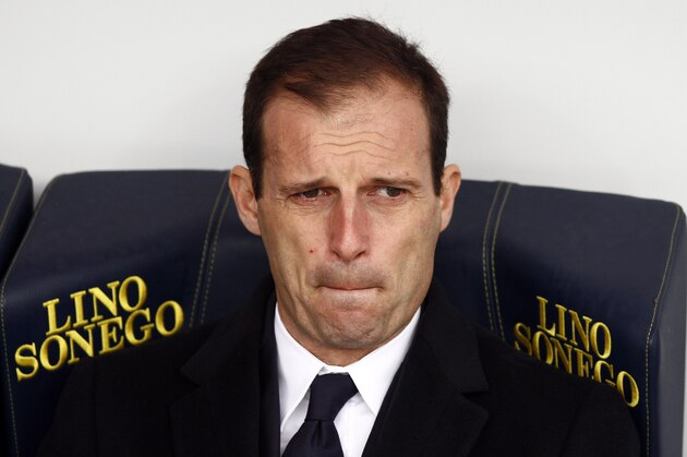 Juventus' coach Massimiliano Allegri sits on the bench prior to during a Serie A soccer match against Chievo Verona at Bentegodi's stadium in Verona, Italy, Sunday, Jan. 31, 2016. (AP Photo/Felice Calabro')