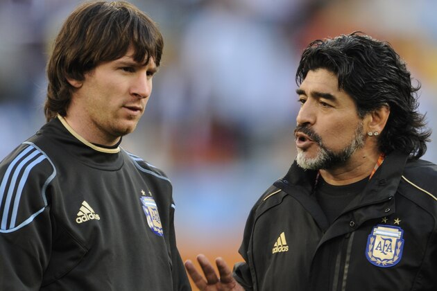 Argentina's coach Diego Maradona (R) speaks to Argentina's striker Lionel Messi prior the 2010 World Cup quarter-final match Argentina vs. Germany on July 3, 2010 at Green Point stadium in Cape Town.  NO PUSH TO MOBILE / MOBILE USE SOLELY WITHIN EDITORIAL ARTICLE -   AFP PHOTO / JAVIER SORIANO (Photo credit should read JAVIER SORIANO/AFP/Getty Images)