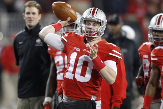 Ohio State quarterback Joe Burrow is seen before the start of an NCAA college football game against Minnesota  Saturday, Nov. 7, 2015, in Columbus, Ohio. Ohio State beat Minnesota 28-14. (AP Photo/Paul Vernon)