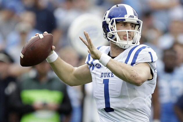 Duke quarterback Thomas Sirk (1) looks to pass against North Carolina during the first half of an NCAA college football game in Chapel Hill, N.C., Saturday, Nov. 7, 2015. (AP Photo/Gerry Broome)