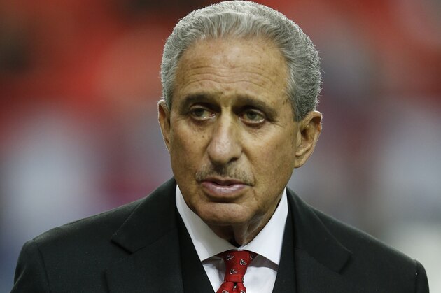 Atlanta Falcons owner Arthur Blank watches teams warm up before the first half of an NFL football game between the Atlanta Falcons and the New Orleans Saints, Sunday, Jan. 3, 2016, in Atlanta. (AP Photo/Butch Dill)