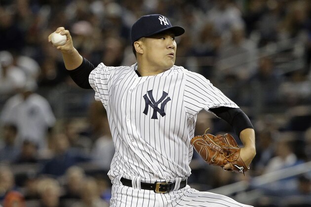 FILE - In this Tuesday, Oct. 6, 2015 file photo, New York Yankees pitcher Masahiro Tanaka delivers against the Houston Astros during the first inning of the American League wild card baseball game in New York.  Yankees pitcher Masahiro Tanaka has undergone arthroscopic surgery to remove a bone spur from his right elbow, Tuesday, Oct. 20, 2015. (AP Photo/Julie Jacobson, File)