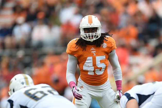 KNOXVILLE, TN - OCTOBER 11:  A.J. Johnson #45 of the Tennessee Volunteers anticipates a play during a game against the Chattanooga Mocs at Neyland Stadium on October 11, 2014 in Knoxville, Tennessee. Tennessee won the game 45-10.  (Photo by Stacy Revere/Getty Images)