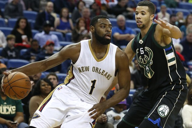 New Orleans Pelicans guard Tyreke Evans (1) drives against Milwaukee Bucks guard Michael Carter-Williams (5) during the second half of an NBA basketball game Saturday, Jan. 23, 2016, in New Orleans. The Pelicans won 116-99. (AP Photo/Jonathan Bachman)
