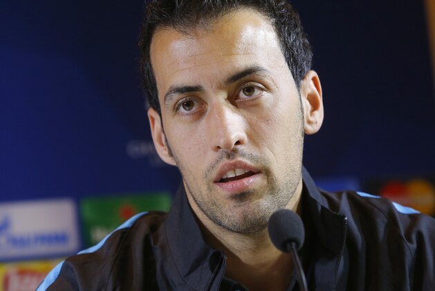 FC Barcelona's Sergio Busquets attends a press conference in Minsk, Belarus, Monday, Oct. 19, 2015.  FC Barcelona will play against  FC BATE Borisov in a Champions League group E soccer match on Tuesday Oct. 20. (AP Photo/Sergei Grits)