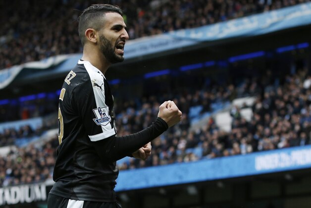 Leicester City's Algerian midfielder Riyad Mahrez celebrates  after scoring his team's second goal during the English Premier League football match between Manchester City and Leicester City at the Etihad Stadium in Manchester, north west England, on February 6, 2016.  / AFP / ADRIAN DENNIS / RESTRICTED TO EDITORIAL USE. No use with unauthorized audio, video, data, fixture lists, club/league logos or 'live' services. Online in-match use limited to 75 images, no video emulation. No use in betting, games or single club/league/player publications.  /         (Photo credit should read ADRIAN DENNIS/AFP/Getty Images)