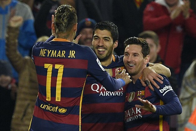 Barcelona's Uruguayan forward Luis Suarez (C) celebrates with Barcelona's Brazilian forward Neymar (L) and Barcelona's Argentinian forward Lionel Messi after scoring a goal during the Spanish Copa del Rey (King's Cup) semmi-finals first leg football match FC Barcelona vs Valencia CF at Camp Nou stadium in Barcelona on February 3, 2016. AFP PHOTO / LLUIS GENE / AFP / LLUIS GENE        (Photo credit should read LLUIS GENE/AFP/Getty Images)
