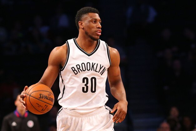 Dec 12, 2015; Brooklyn, NY, USA;  Brooklyn Nets forward Thaddeus Young (30) advances the ball during the first quarter against the Los Angeles Clippers at Barclays Center. Mandatory Credit: Anthony Gruppuso-USA TODAY Sports