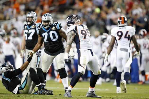 SANTA CLARA, CA - FEBRUARY 07:  Derek Wolfe #95 of the Denver Broncos reacts after a sack in the third quarter against  Cam Newton #1 of the Carolina Panthers during Super Bowl 50 at Levi's Stadium on February 7, 2016 in Santa Clara, California.  (Photo by Ezra Shaw/Getty Images)