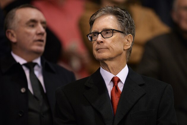 Liverpool's US owner John W Henry  looks on before  a UEFA Europa League group B football match between Liverpool FC and FC Rubin Kazan at Anfield in Liverpool, north west England, on October 22, 2015.  AFP PHOTO / OLI SCARFF        (Photo credit should read OLI SCARFF/AFP/Getty Images)