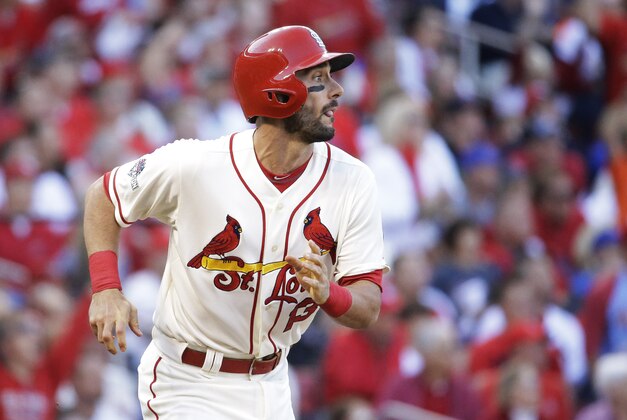 St. Louis Cardinals' Matt Carpenter  runs after hitting a solo home run during the first inning of Game 2 in baseball's National League Division Series against the Chicago Cubs, Saturday, Oct. 10, 2015, in St. Louis. (AP Photo/Jeff Roberson)