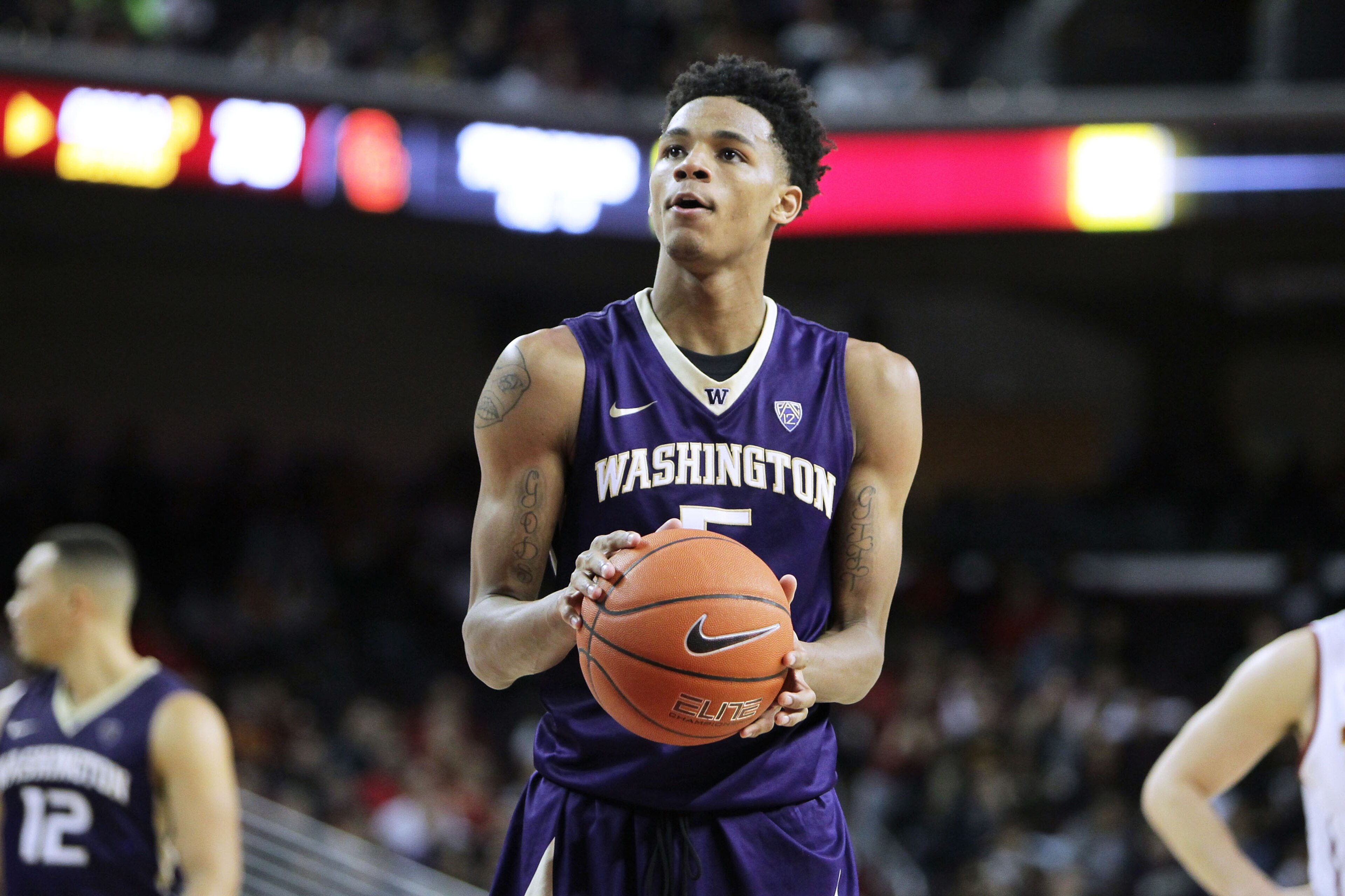 LOS ANGELES, CA - JANUARY 30: Dejounte Murray #5 of the Washington Huskies shoot free throws against the USC Trojans during a NCAA college basketball game at Galen Center on January 30, 2016 in Los Angeles, California. (Photo by Leon Bennett/Getty Images) LOS ANGELES, CA - JANUARY 30: Dejounte Murray #5 of the Washington Huskies shoot free throws against the USC Trojans during a NCAA college basketball game at Galen Center on January 30, 2016 in Los Angeles, California. (Photo by Leon Bennett/Getty Images)