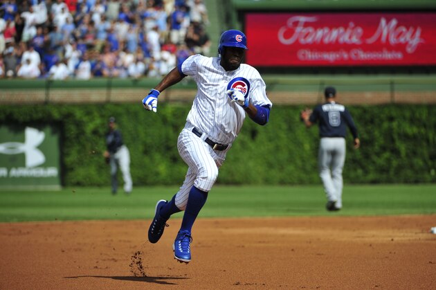 CHICAGO, IL - AUGUST 22:  Dexter Fowler #24 of the Chicago Cubs runs for a triple against the Atlanta Braves during the first inning on August 22, 2015 at Wrigley Field in Chicago, Illinois. (Photo by David Banks/Getty Images)