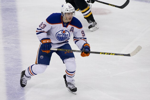 Edmonton Oilers' Ryan Nugent-Hopkins (93) plays in an NHL hockey game against the Pittsburgh Penguins in Pittsburgh Saturday, Nov. 28, 2015. The Oilers won 3-2 in a shootout. (AP Photo/Gene J. Puskar)
