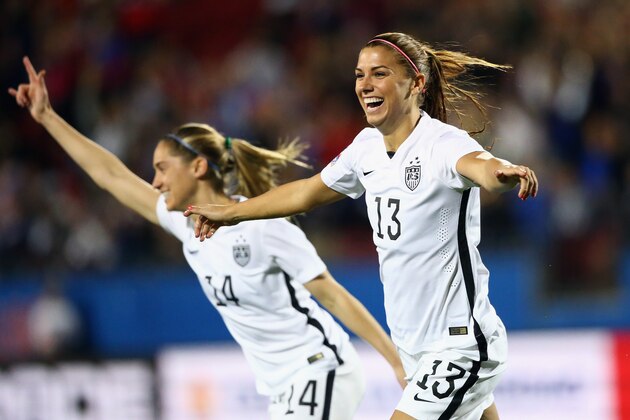 FRISCO, TX - FEBRUARY 10:  Alex Morgan #13 of USA celebrates her goal in the first minute of play against Puerto Rico during 2016 CONCACAF Women's Olympic Qualifying at Toyota Stadium on February 10, 2016 in Frisco, Texas.  (Photo by Ronald Martinez/Getty Images)