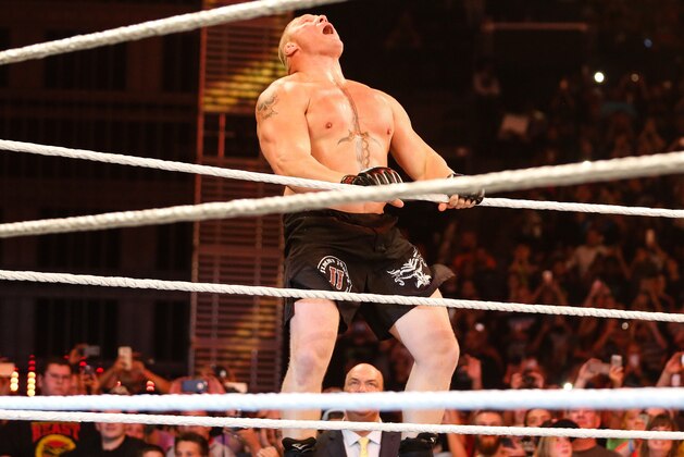 NEW YORK, NY - AUGUST 23:  Brock Lesnar enters the ring at the WWE SummerSlam 2015 at Barclays Center of Brooklyn on August 23, 2015 in New York City.  (Photo by JP Yim/Getty Images)